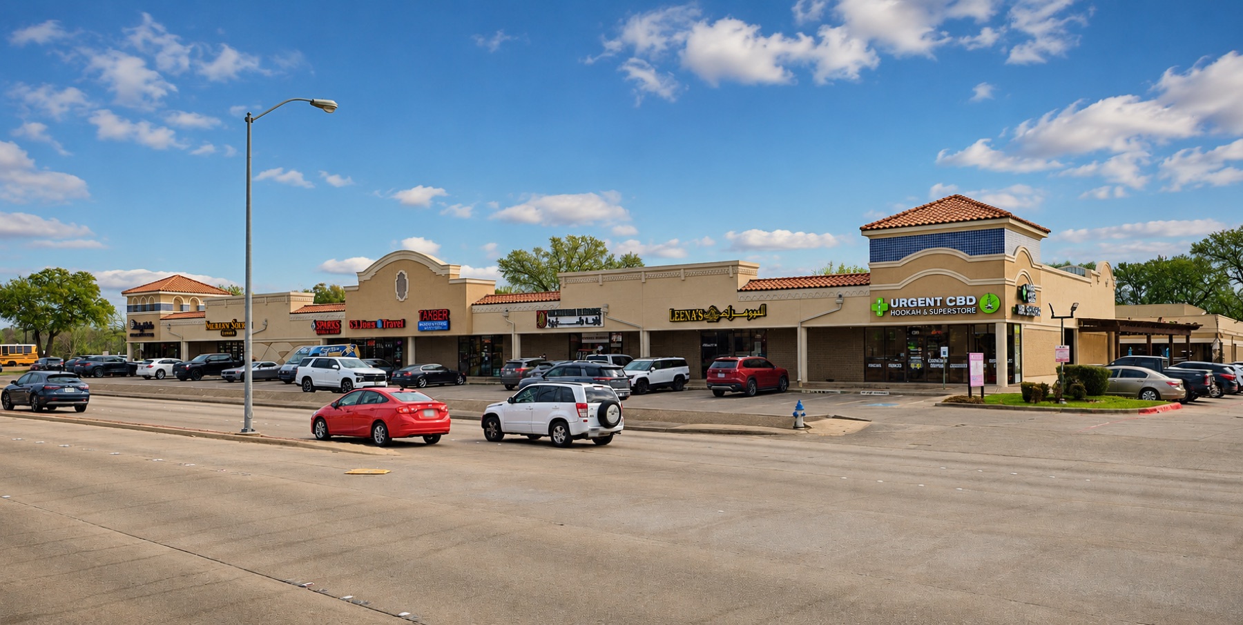 After: renovated Greenville Avenue retail center with updated storefronts